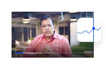 Video tutorial dagangan dalam aplikasi dengan pengajar di sebelah ikon carta pasaran saham.